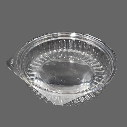 Clear plastic food container with lid on a black background