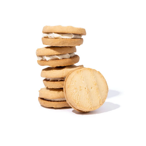Stack of cookies with cream filling on a white background