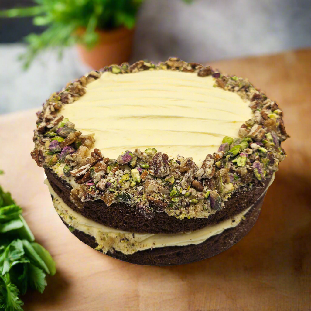 Two-layered dessert with creamy filling and pistachio crumb topping