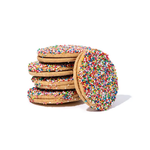 Stack of cookies with colorful sprinkles on a white background